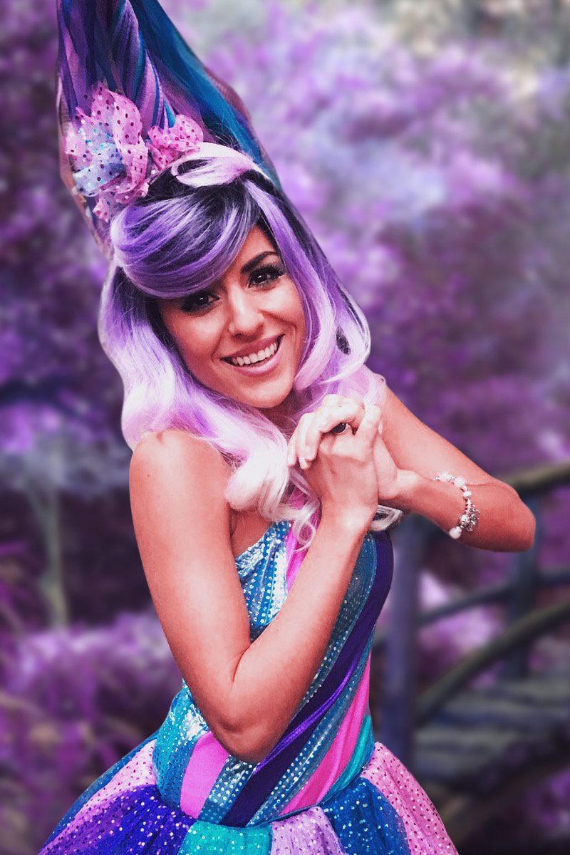 Unicorn Princess character at a children's birthday party with kids